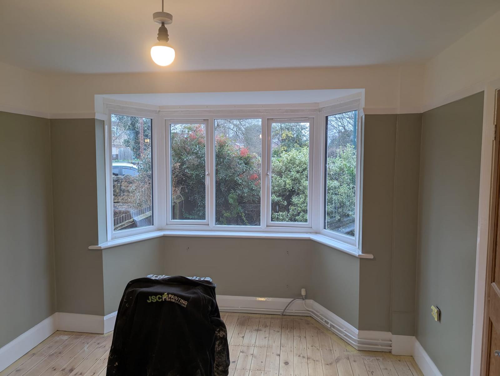 Living room with bay window decorated by JSC in Nottingham
